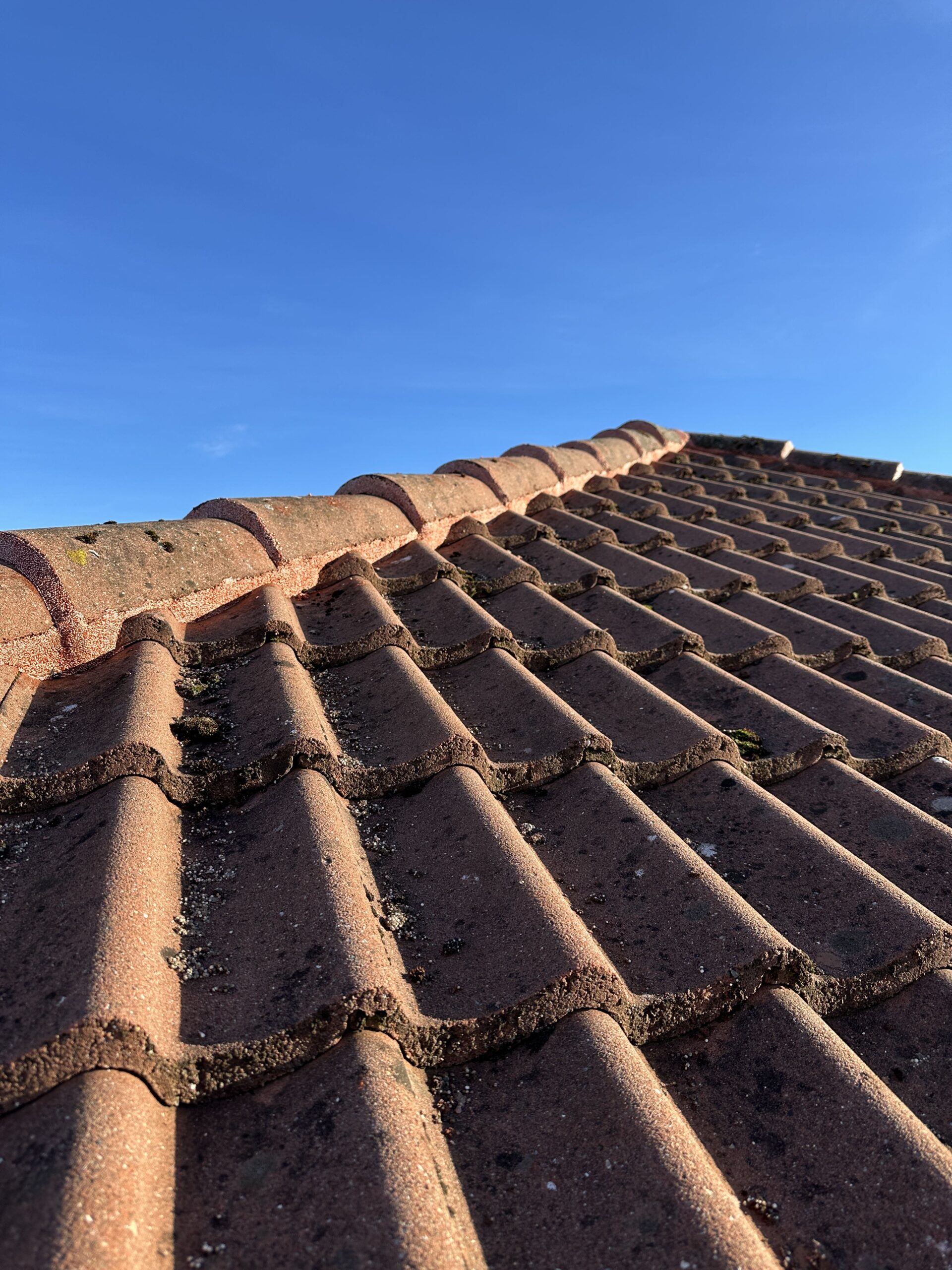 Tagreparation i Smørum – færdigudført reparation af rygning på tegltag